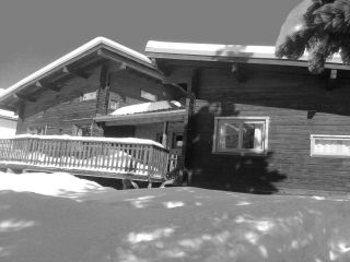 Exterior view of the chalet in winter